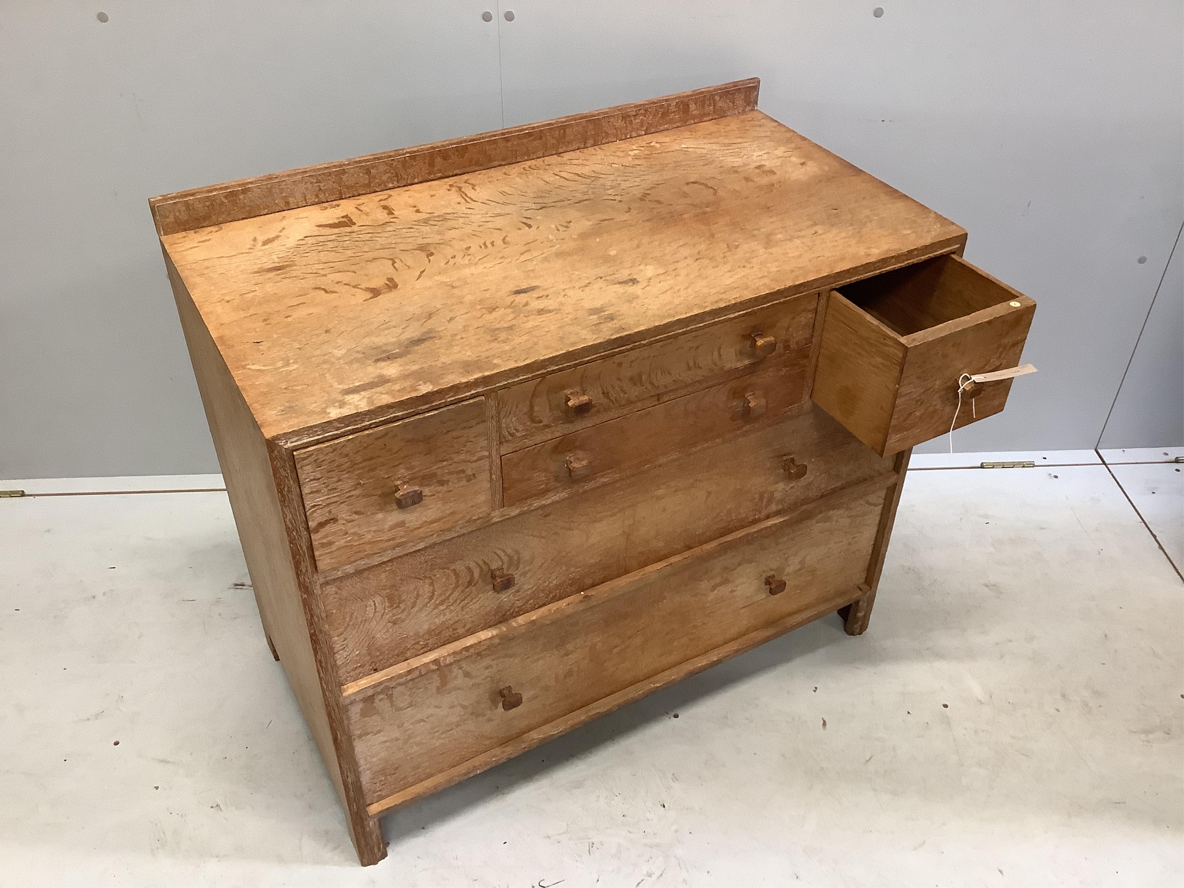 Heal & Son Ltd. A weathered oak six drawer chest, width 91cm, depth 47cm, height 80cm, and a triple dressing table mirror. Condition - fair